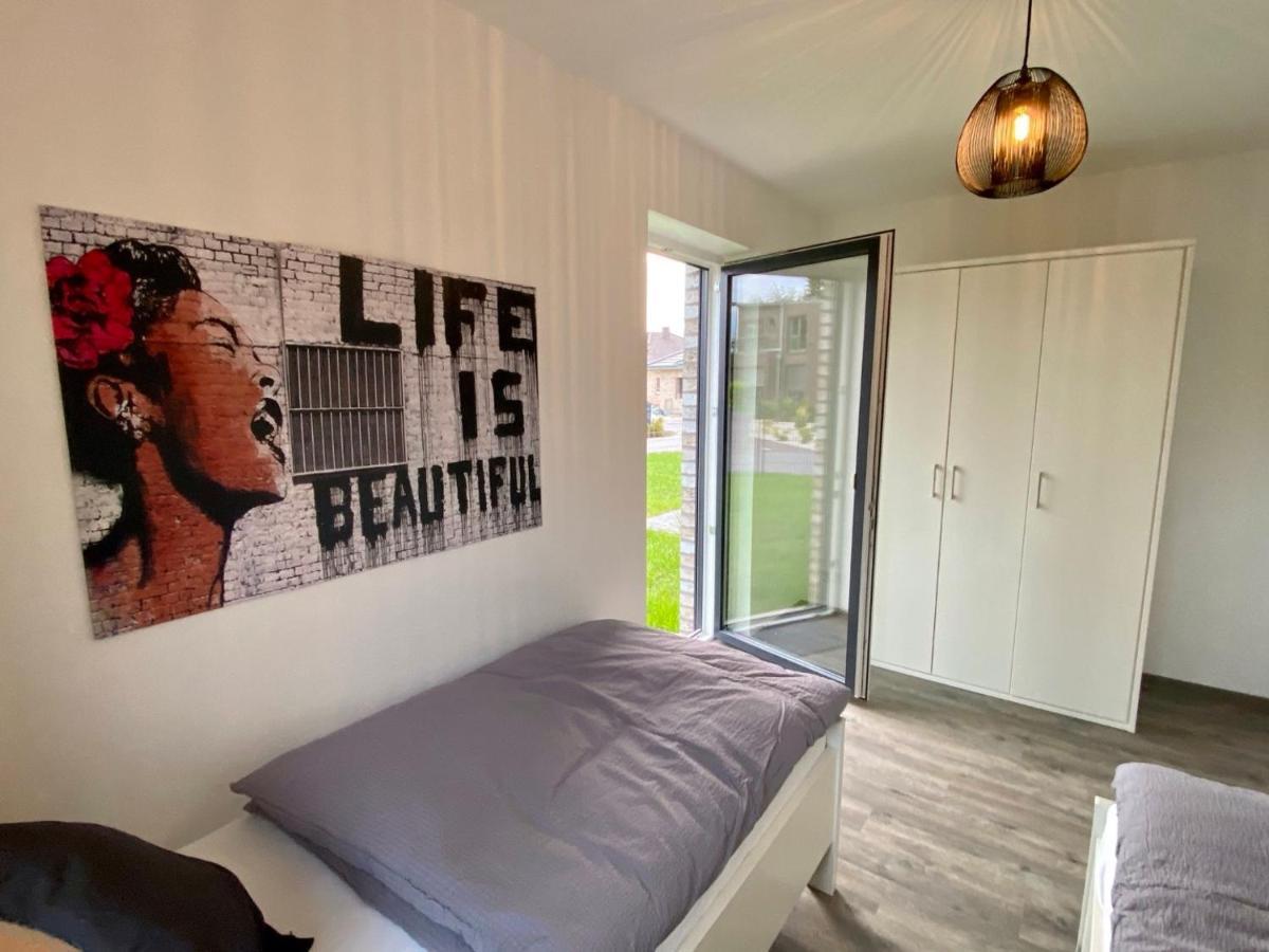 Ferienhaus Moin. Am Harkebruegger See Mit Sauna Barssel  Luaran gambar